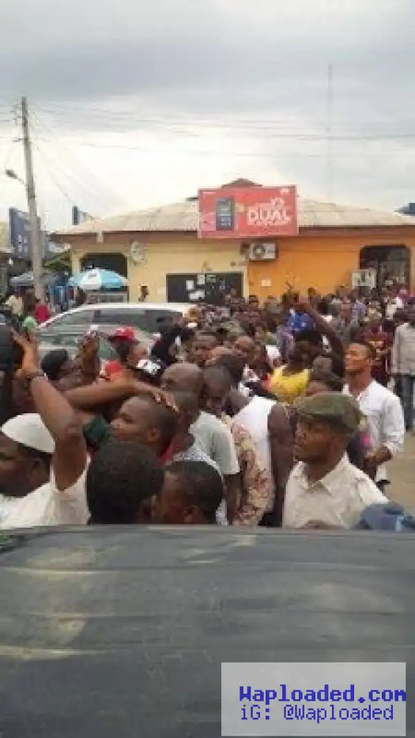 Photos: Ekiti residents line up to collect "stomach infrstructure" Easter rice